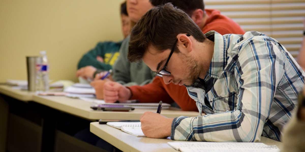 A male student in class